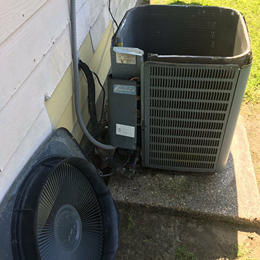 External Air Conditioning Unit Being Worked On